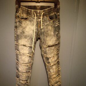 Women's VIP distressed blue jeans.